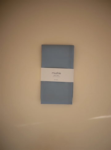 Mushie stoleunderlag - Underlag til højstol - Tradewinds - i blå